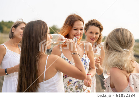 The company of gorgeous female friends having fun, The company of gorgeous female friends having fun, 61852334