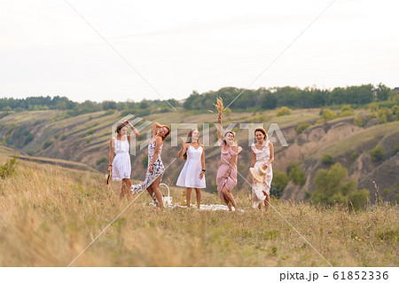 The company of cheerful female friends have a The company of cheerful female friends have a 61852336