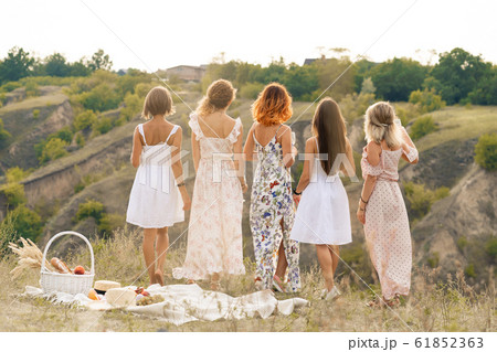 View from back. The company of gorgeous female View from back. The company of gorgeous female 61852363