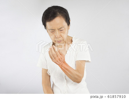 old asian woman feel wrist bones injury old asian woman feel wrist bones injury 61857910