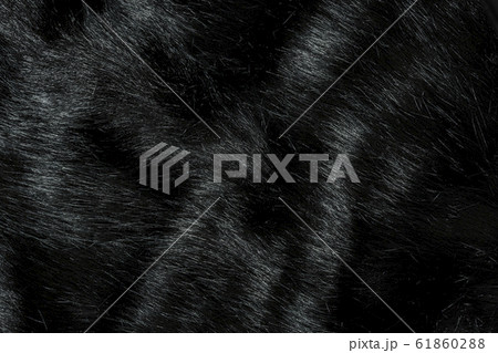 合成動物の長い髪で作られた黒い毛皮の背景テクスチャ の写真素材