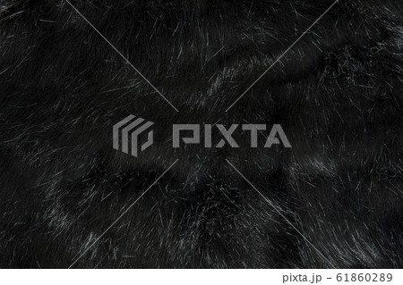 合成動物の長い髪で作られた黒い毛皮の背景テクスチャ の写真素材