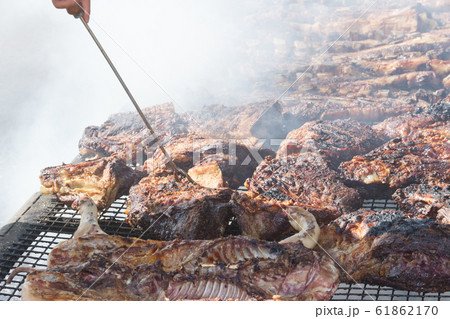 traditional meat grilled on the grill in the 61862170