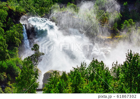 Briksdal waterfall in Norway Briksdal waterfall in Norway 61867302