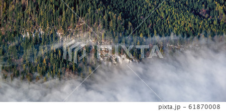 Autumn Alps mountain misty morning view from Autumn Alps mountain misty morning view from 61870008