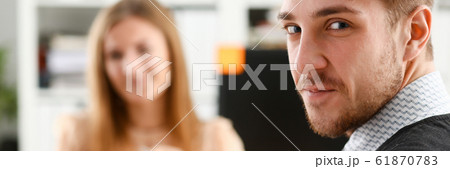 Handsome smiling businessman in suit 61870783