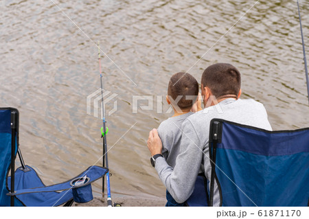 A happy family spends time together they teach 61871170