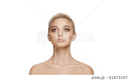 Beautiful female face with lighting up arrows isolated on white background Beautiful female face with lighting up arrows isolated on white background 61873107
