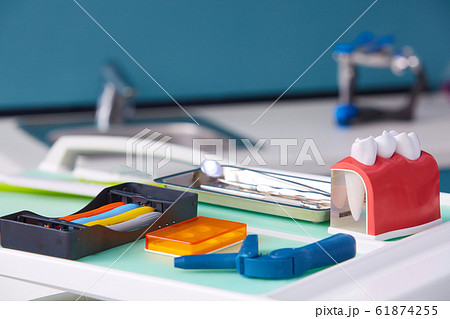 Dental model and dental equipment. Concept image of dental background. Dental hygiene background Dental model and dental equipment. Concept image of dental background. Dental hygiene background 61874255