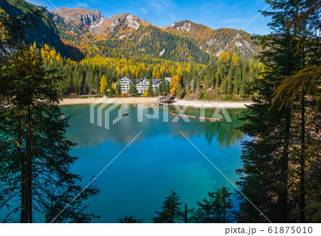 Autumn peaceful alpine lake Braies or Pragser 61875010