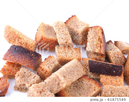 pieces of dried bread on a white background pieces of dried bread on a white background 61875589