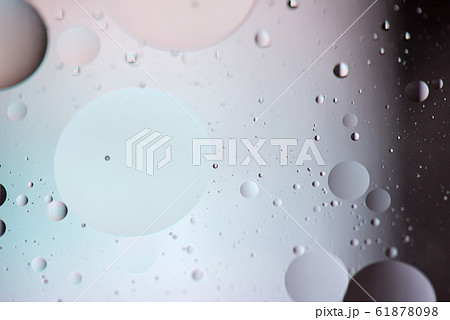 Defocused pastel and dark colored abstract background picture made with oil, water and soap Defocused pastel and dark colored abstract background picture made with oil, water and soap 61878098