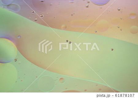 Defocused pastel colored abstract background picture made with oil, water and soap Defocused pastel colored abstract background picture made with oil, water and soap 61878107