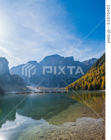 Autumn peaceful alpine lake Braies or Pragser 61878403