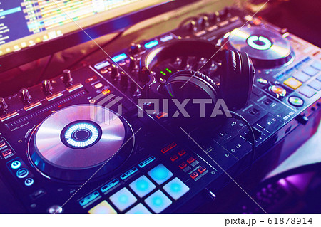 Dj mixes the track in the nightclub at a party 61878914