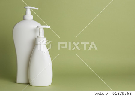 White plastic soap dispensers. Copy space. Place for text. 61879568