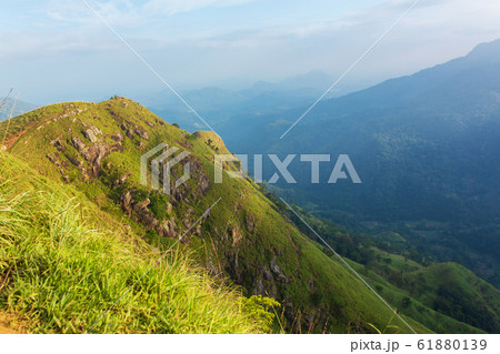 Mountain landscape, green slopes. Beauty of 61880139