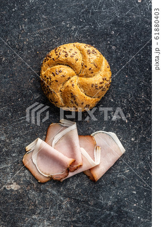 Sliced smoked ham. Tasty pork meat. Sliced smoked ham. Tasty pork meat. 61880403
