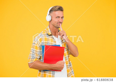 Audio library. Man handsome college student 61880638