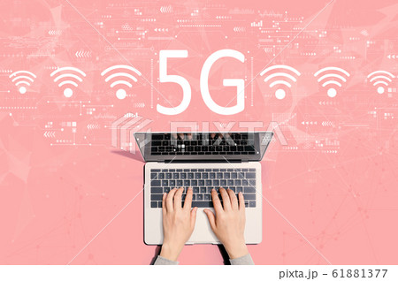 5G network with person using laptop 61881377