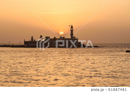 Haji Ali Dargah mosque and tomb on sunset. Mumbai. Haji Ali Dargah mosque and tomb on sunset. Mumbai. 61887481