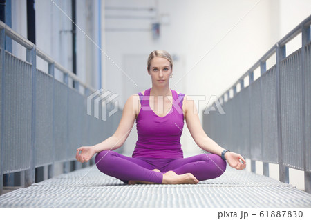 young active women doing yoga at outdoor 61887830