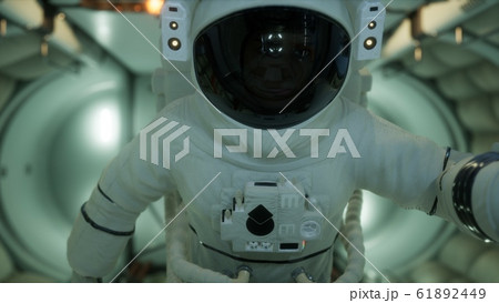 astronaut inside the orbital space station astronaut inside the orbital space station 61892449