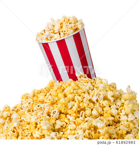 Paper striped bucket on a heap of popcorn isolated on white background 61892983