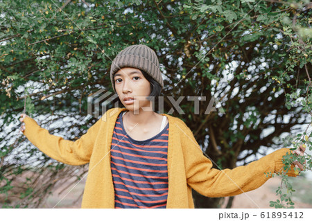 Asian little girl posing In the midst of nature in the morning 61895412