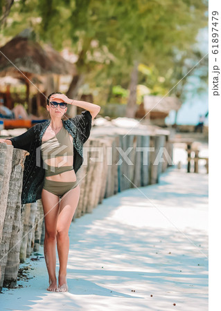 Young beautiful woman on the beach vacation 61897479