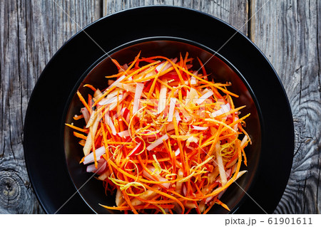 carrot radish and apple salad, top view 61901611
