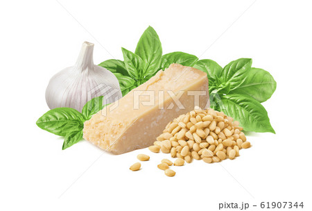 Fresh pesto ingredients, green basil leaves, cheese, garlic and pine nuts isolated 61907344