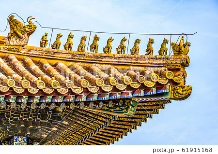 China, Beijing, Forbidden City Different design elements of the colorful buildings rooftops closeup details 61915168