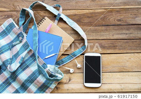 notbook monthly planner in cloth bag with mobile phone for business work of lifestyle at office  61917150