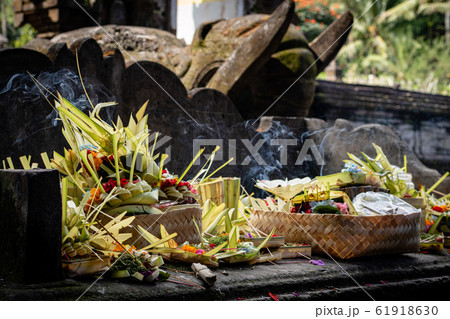 Incense and offerings in a Balinese temple 61918630