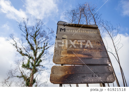 Burnt sign on the road after a forest fire in Monchique, Portugal. Portimao, Monchique, Alcaria do Peso, village name, weight. 61921518