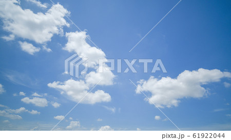 clear blue sky background,clouds with background. 61922044