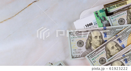 Stimulus economic tax return check and US 100 Stimulus economic tax return check and US 100 61923222