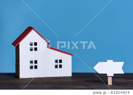Miniature home with wooden signboard. Own house Miniature home with wooden signboard. Own house 61924924