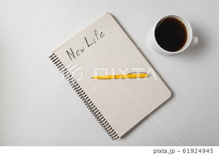 Top view of notebook with New Life inscription. Top view of notebook with New Life inscription. 61924945