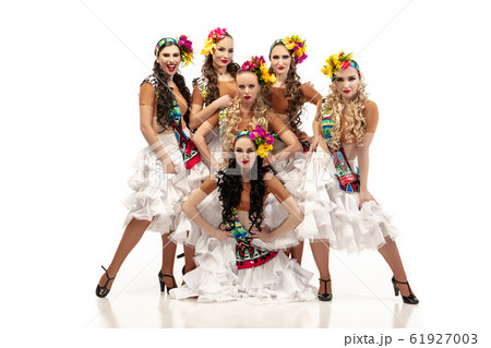 Beautiful young women in carnival and masquerade costumes on white studio background Beautiful young women in carnival and masquerade costumes on white studio background 61927003