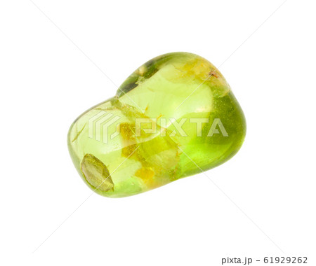 Peridot (Olivine, chrysolite) gem stone isolated 61929262