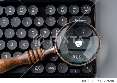 Medical retro keyboard with magnifying glass 61929840