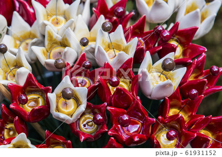 Traditional Hungarian ceramic flowers to decorate the interior of gardens and flower pots  61931152