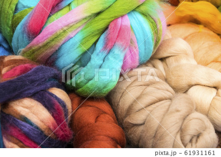 Background colored braids threads filmed close-up. 61931161