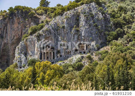 The ruins of ancient antique tombs of Lycian kings in modern Turkey. 61931210
