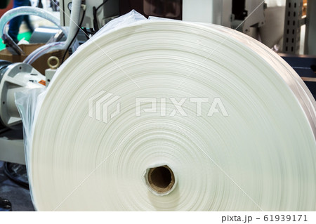 roll of cellophane from the conveyor in production 61939171