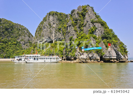 Tourist boats in Halong bay, Vietnam Tourist boats in Halong bay, Vietnam 61945042