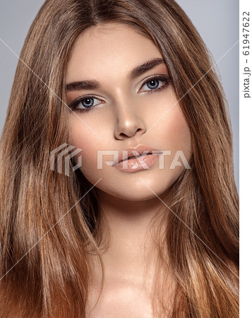 Woman with beauty long brown hair and natural 61947622