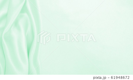 Smooth elegant green silk or satin luxury cloth Smooth elegant green silk or satin luxury cloth 61948672